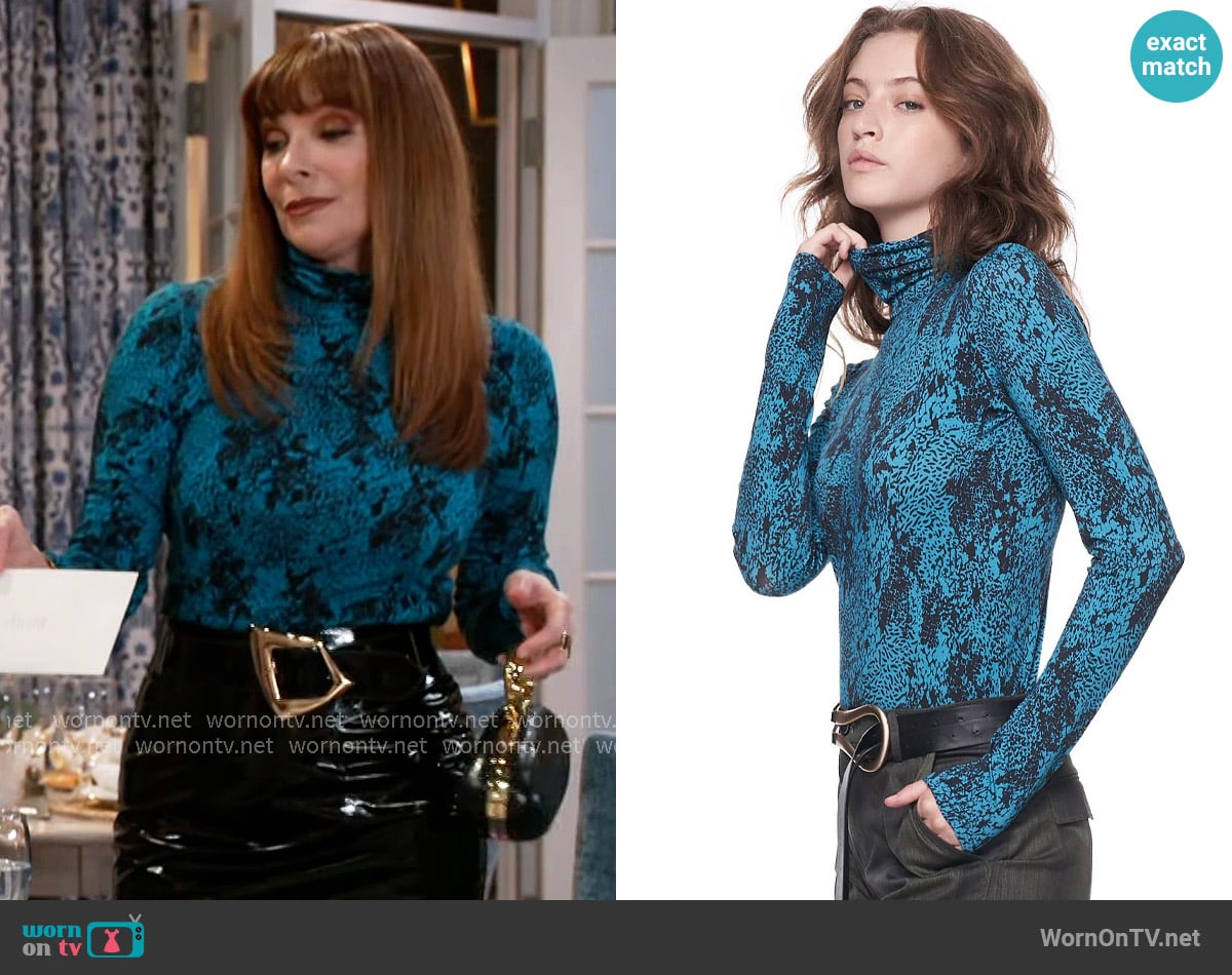 The Kit Turtleneck in Cerulean Complication worn by Pamela Curtis (Cady McClain) on Beyond the Gates