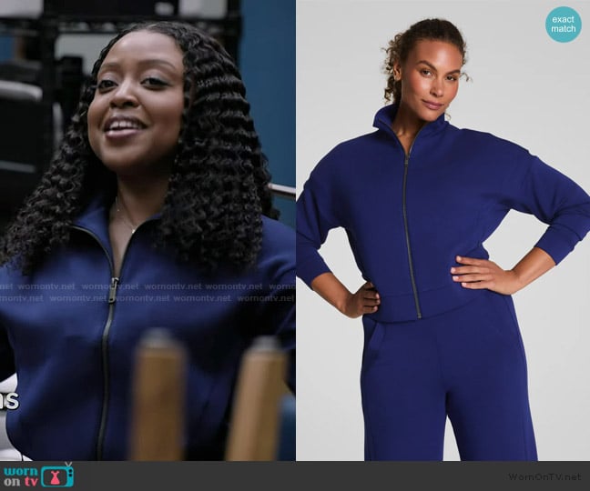 Janine’s blue track jacket on Abbott Elementary