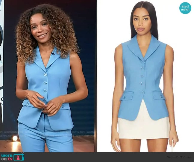 Zuri’s blue vest on Access Hollywood