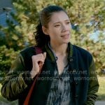 Violet's tie-dye shirt and navy and green bomber jacket on Chicago Fire