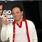 Anthony Ramos’s white contrast collar polo and cardigan on Good Morning America