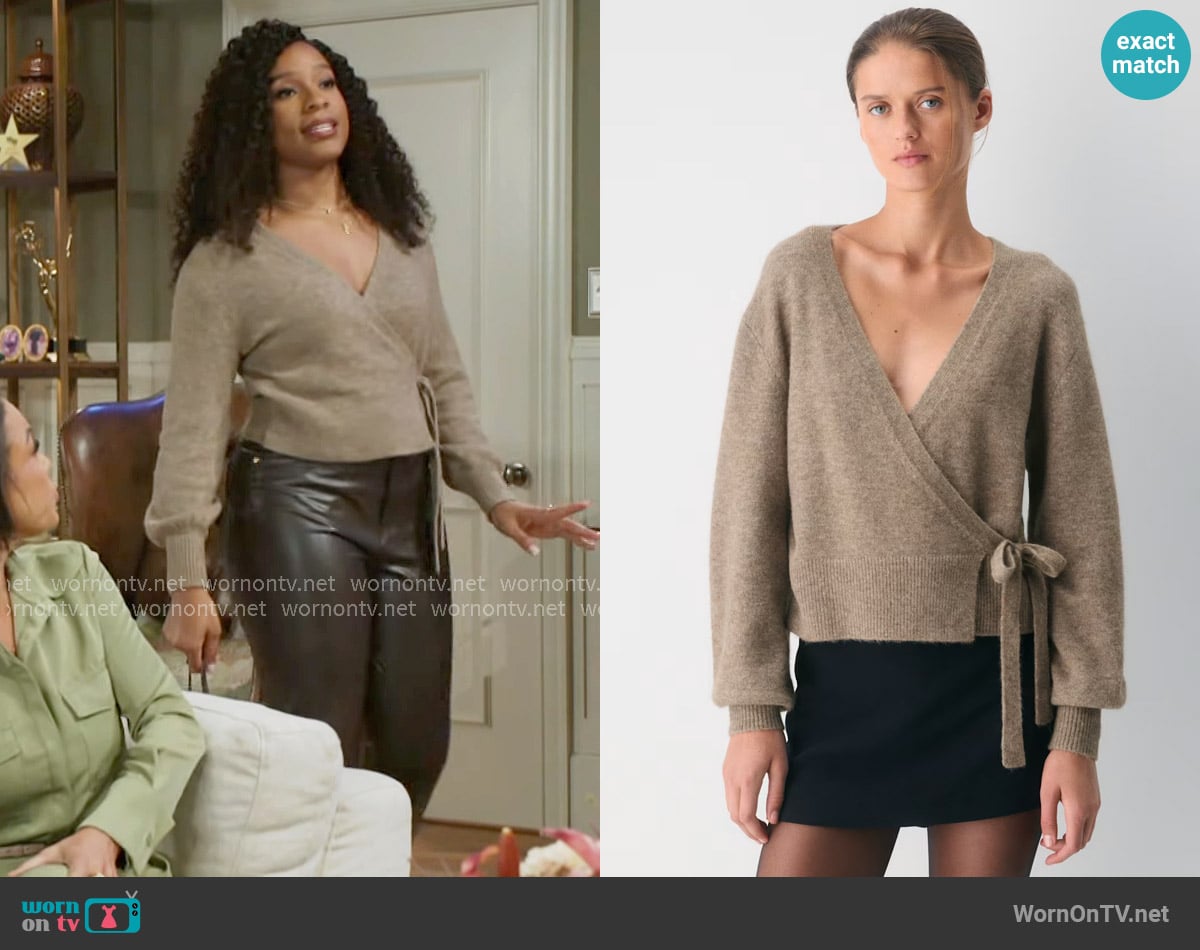 Naomi’s beige wrap sweater on Beyond the Gates Naomi’s beige wrap sweater on Beyond the Gates