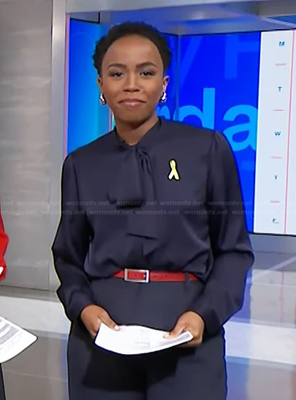 Zinhle's navy tie neck blouse on NBC News Daily