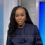Zinhle's navy tie neck blouse on NBC News Daily