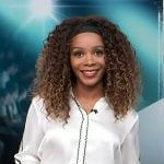 Zuri’s white scalloped trim shirt on Access Hollywood