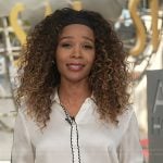 Zuri’s white scalloped trim shirt on Access Hollywood