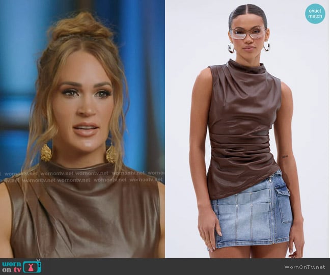 Akira Locked and Loaded Faux Leather Blouse in oxblood worn by Carrie Underwood on American Idol