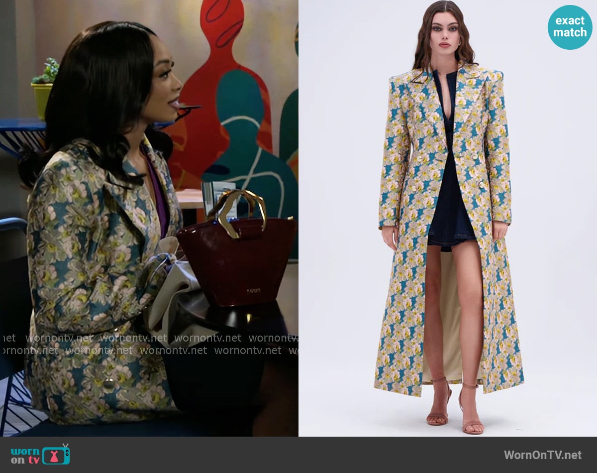 Akira Scarlett Luxe Trench in Brocade worn by Madison Montgomery (Kenjah) on Beyond the Gates