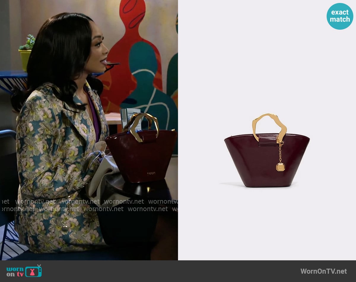 Aldo Goldenview Bag worn by Madison Montgomery (Kenjah) on Beyond the Gates