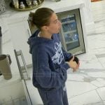 Amanda’s blue embroidered hoodie and sweatpants on Summer House