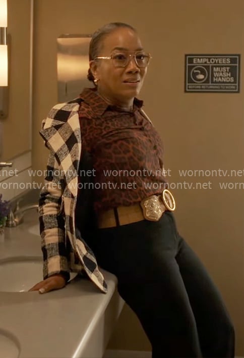 Amanda's red leopard print shirt and checked blazer on Will Trent