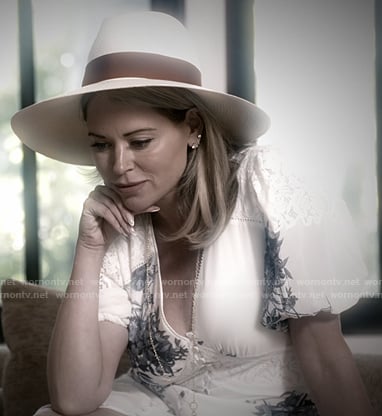 Amanda’s white floral v-neck dress on The Real Housewives of Beverly Hills