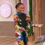 Amber Ruffin's black floral print blouse and pants on Sherri