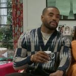 Andre’s navy and grey printed cardigan on Beyond the Gates