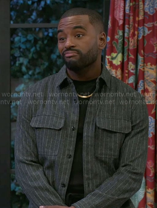 Andre’s grey pinstripe jakcet on Beyond the Gates