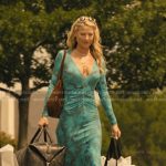 Angela’s blue printed v-neck dress on Landman