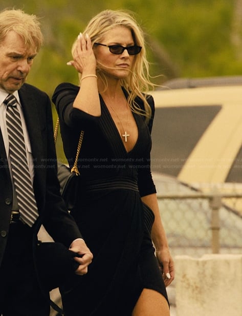 Angela's black plunging neckline dress on Landman