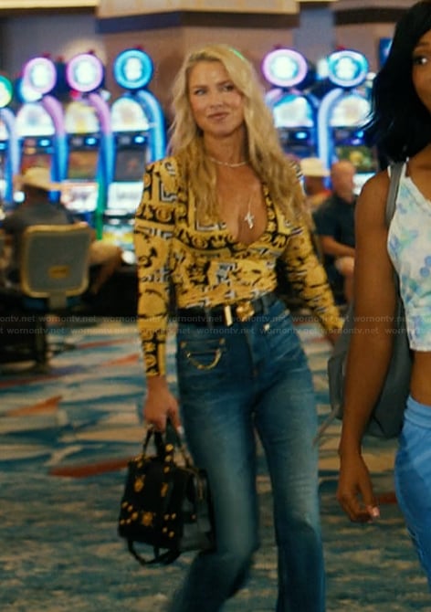 Angela's black studded leather bag on Landman