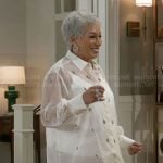 Anita’s sheer white embellished shirt on Beyond the Gates