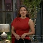 Audra’s red asymmetric top on The Young and the Restless