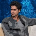 Avan Jogia’s gray suede jacket on Access Hollywood