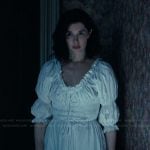 Betsy’s white ruffle trim dress on The Burbs