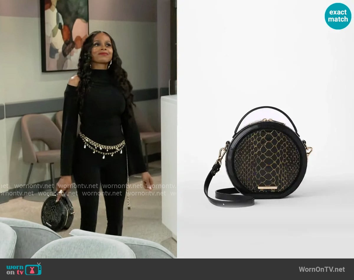 Brahmin Lane Bag in Black Cavatica worn by Hayley Lawson (Marquita Goings) on Beyond the Gates