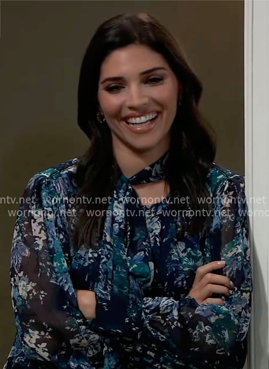 Brook Lynn’s blue floral tie-neck blouse on General Hospital