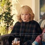 Lynn’s brown check poncho jacket on The Burbs