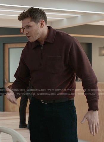 Buck’s burgundy half-zip sweatshirt on 9-1-1