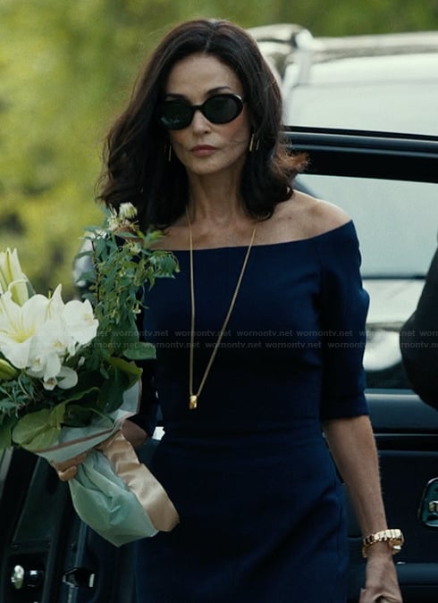 Cami's navy off shoulder dress on Landman