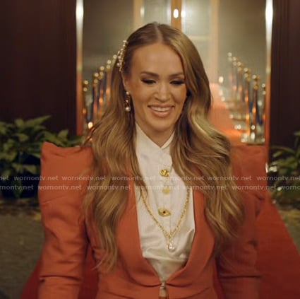 Carrie’s orange puff shoulder jacket on American Idol