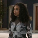 Chelsea's black and white floral top with studded jeans on Beyond the Gates