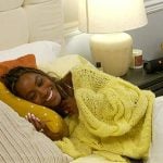 Ciara’s yellow cableknit sweater on Summer House