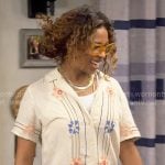 Courtney's floral embroidered shirt on The Neighborhood