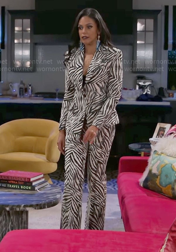 Dani’s zebra print suit on Beyond the Gates