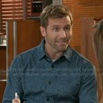 Derek’s blue shirt on Beyond the Gates