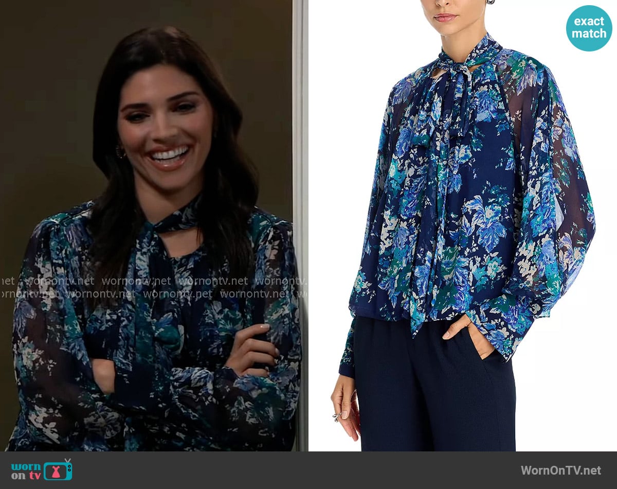 Brook Lynn’s blue floral tie-neck blouse on General Hospital