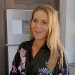 Dorit’s black floral robe on The Real Housewives of Beverly Hills