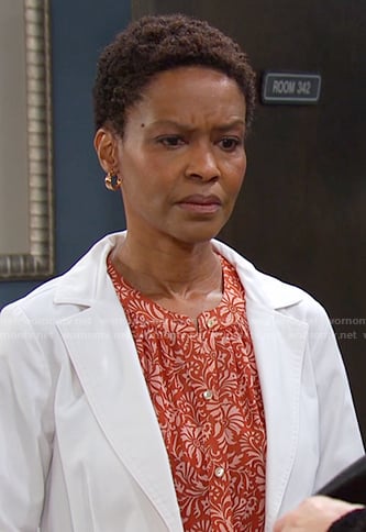 Dr. Gregory's orange floral blouse on Days of our Lives