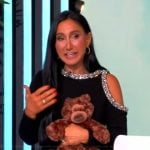 Elizabeth Werner's black embellished cold shoulder top on The View