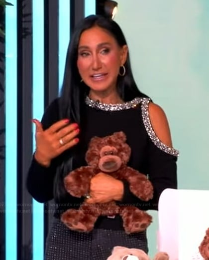 Elizabeth Werner’s black embellished cold shoulder top on The View