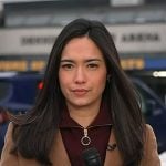 Emile’s purple half-zip sweater and brown coat on Today