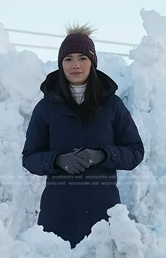 Emilie’s navy down coat and purple knit beanie on Today