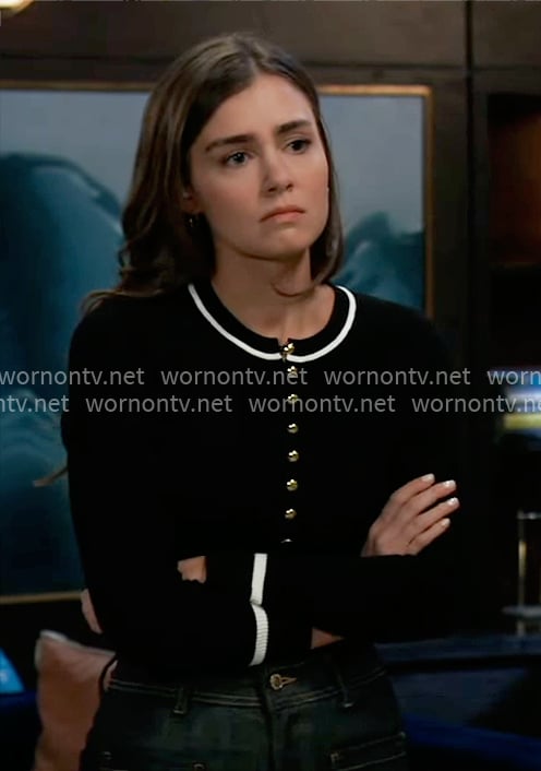 Emma's black top with gold buttons and white stripe trim on General Hospital