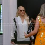 Erika’s white striped shirt and pants on The Real Housewives of Beverly Hills
