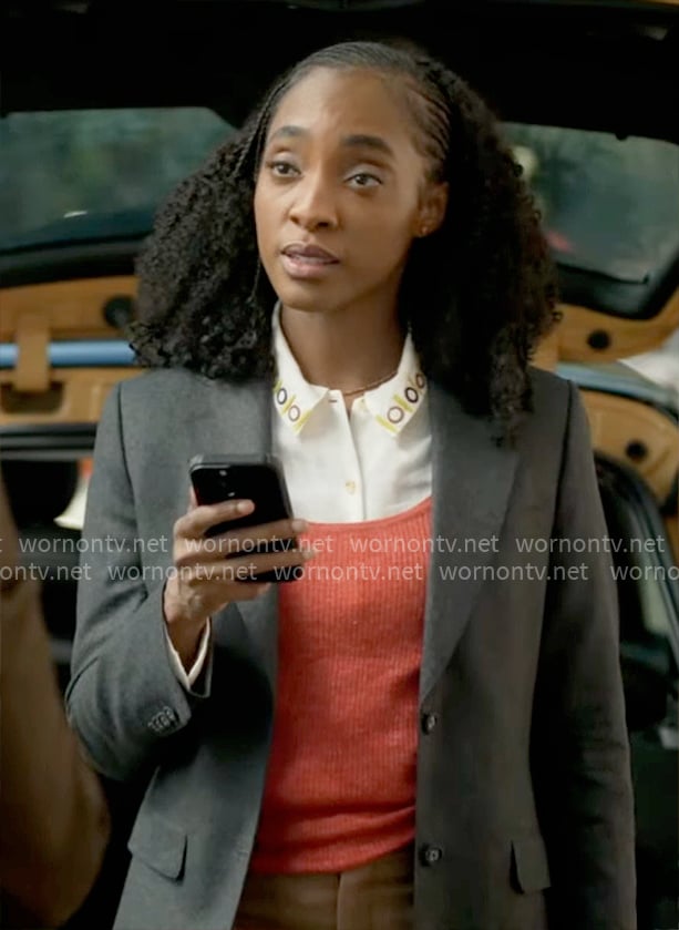 Faith’s white embroidered linen shirt and orange rib tank top on Will Trent