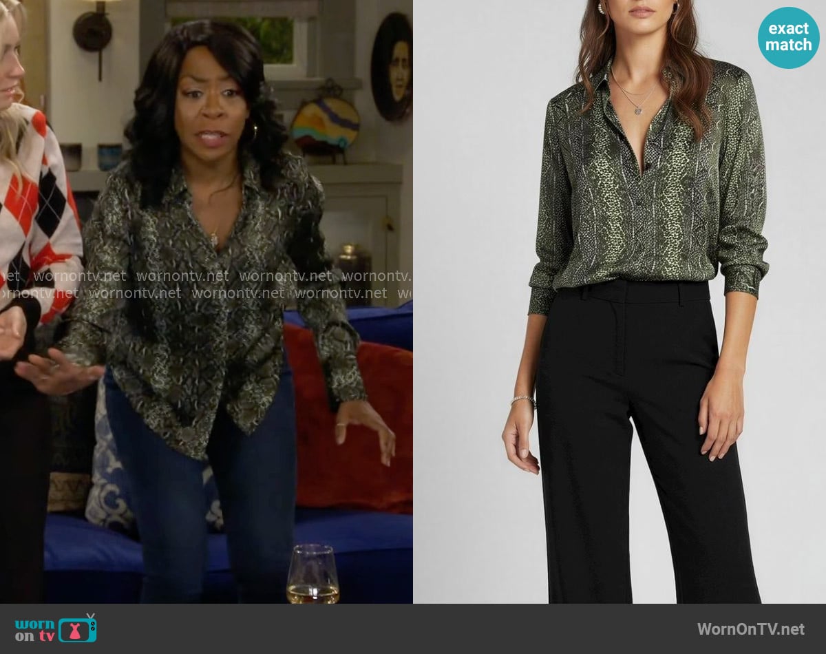 Favorite Daughter The Take Me Seriously Top in Serpiente worn by Tina Butler (Tichina Arnold) on The Neighborhood