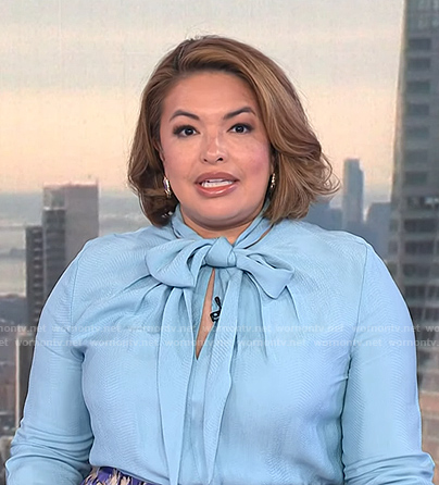 Gilma’s blue tie neck blouse on NBC News Daily