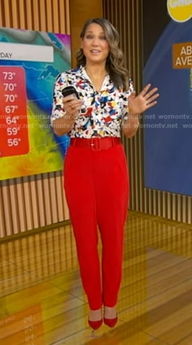 Ginger’s printed button down shirt and red belted pants on Good Morning America